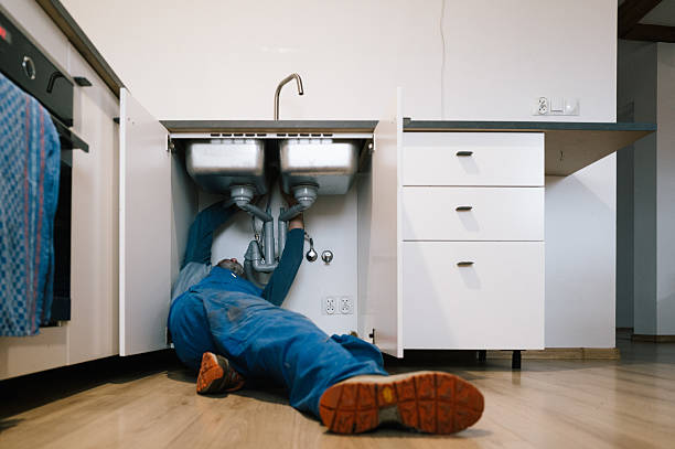 Professional Emergency Plumber technician working in Cascade, ID